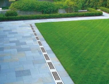 Why Discrete Threshold Drainage is the Secret to a Flawless, Luxury Patio Design